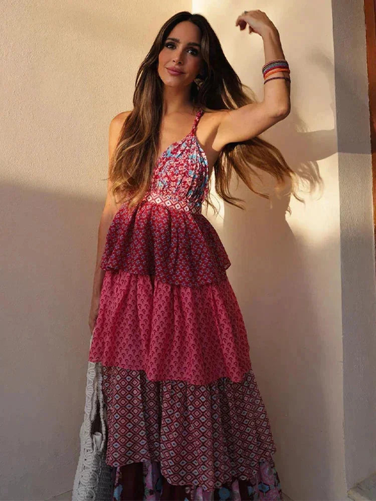 "Red and pink sleeveless dress with multi-tier design, made of lightweight breathable fabric"