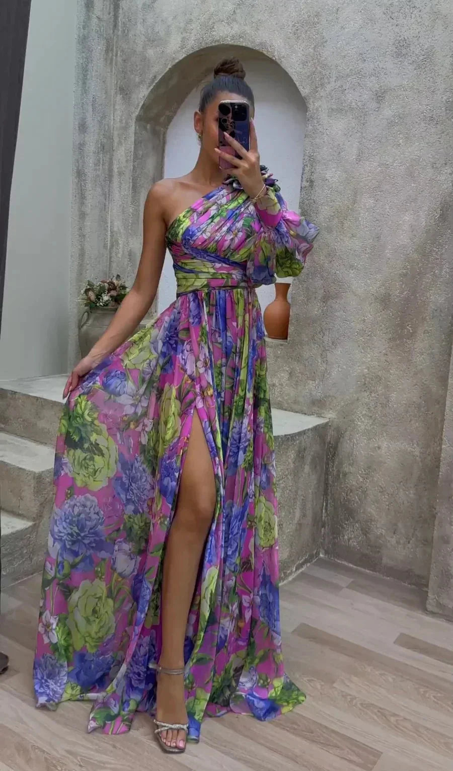 "Flowing one-shoulder floral dress in Purple, showcasing a vibrant floral pattern and a stylish asymmetrical design."