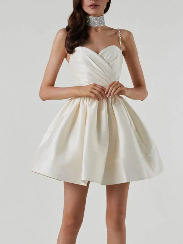 Satin mini dress with rhinestone strap in textured fabric - Carrington style.