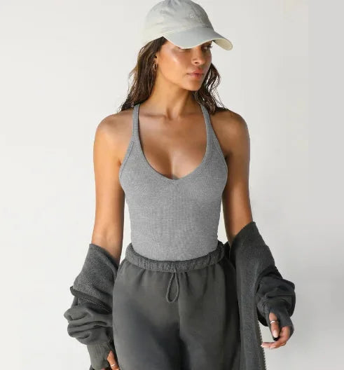 Light grey Madaline seamless athletic tank for active wear, featuring stretchy and breathable fabric for comfort during…