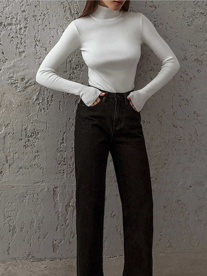 Seamless turtleneck in a versatile design by Kori, ideal for layering.