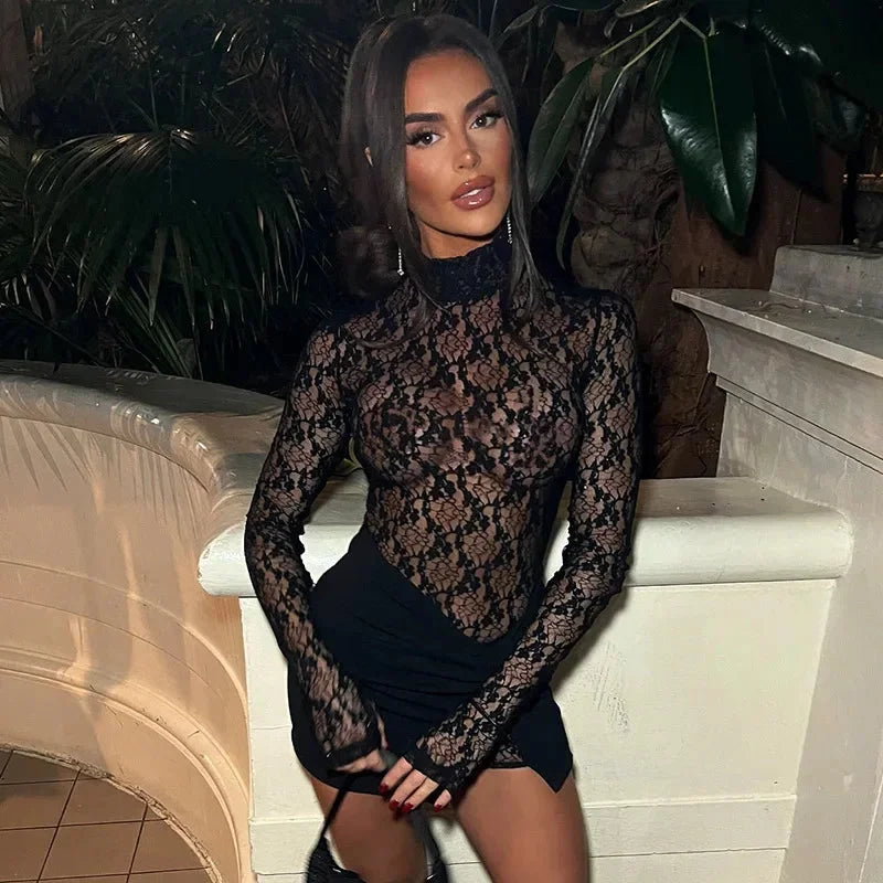 Form-fitting mini dress featuring delicate lace detailing, ideal for a sophisticated look.