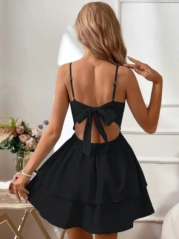 Arwyn - Adjustable strap tiered mini dress in soft cotton blend with boho-chic tiered design, perfect for casual summer…