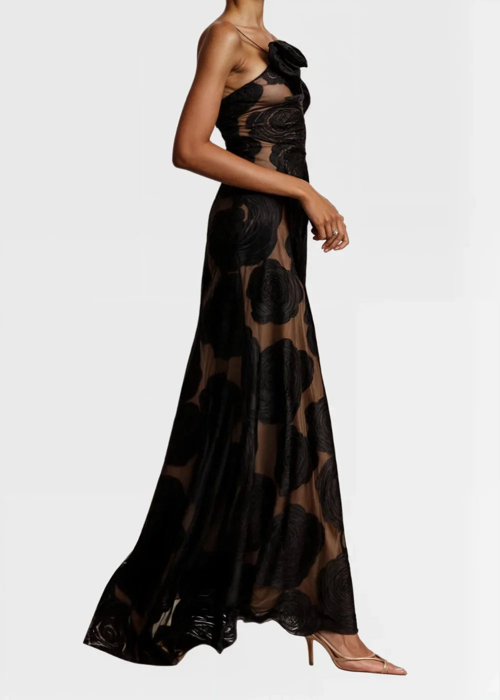 Noelani sheer one-shoulder maxi dress featuring elegant black roses design. Perfect for a chic and sophisticated look.