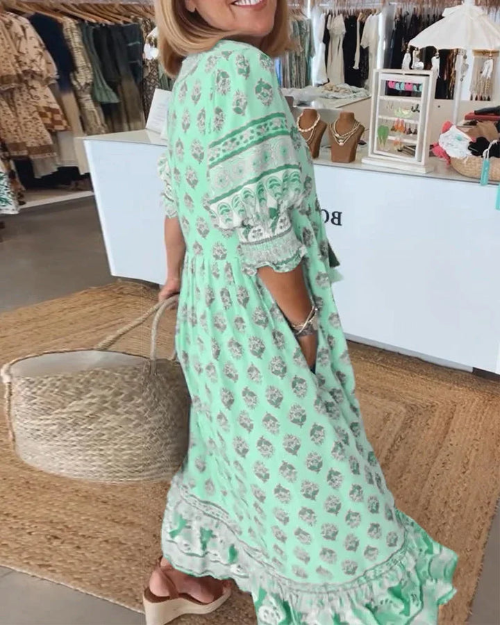 Boho midi dress in Swayzie style with tassel tie detail, perfect for a casual yet trendy look.