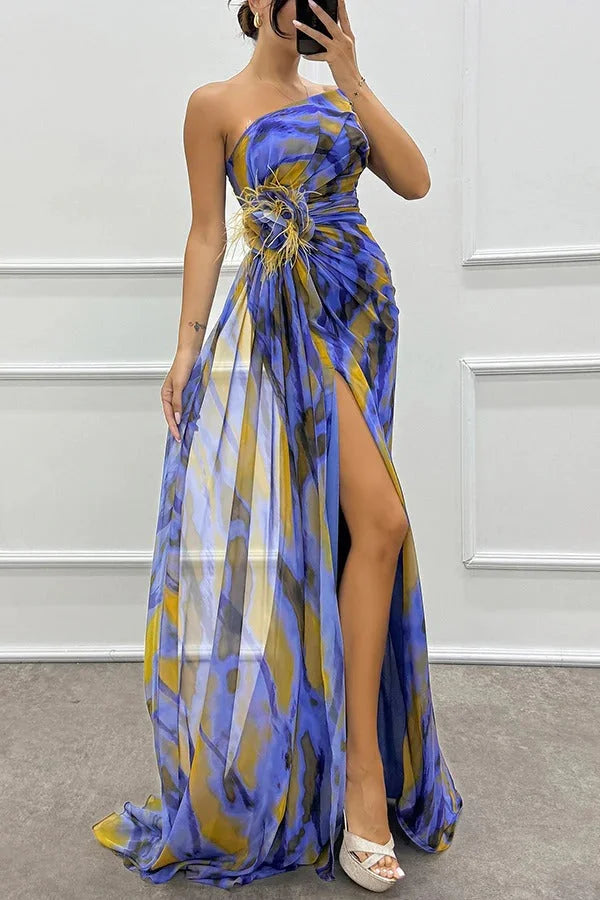 Strapless maxi dress in navy blue with elegant floral accent, perfect for summer weddings and outdoor events.