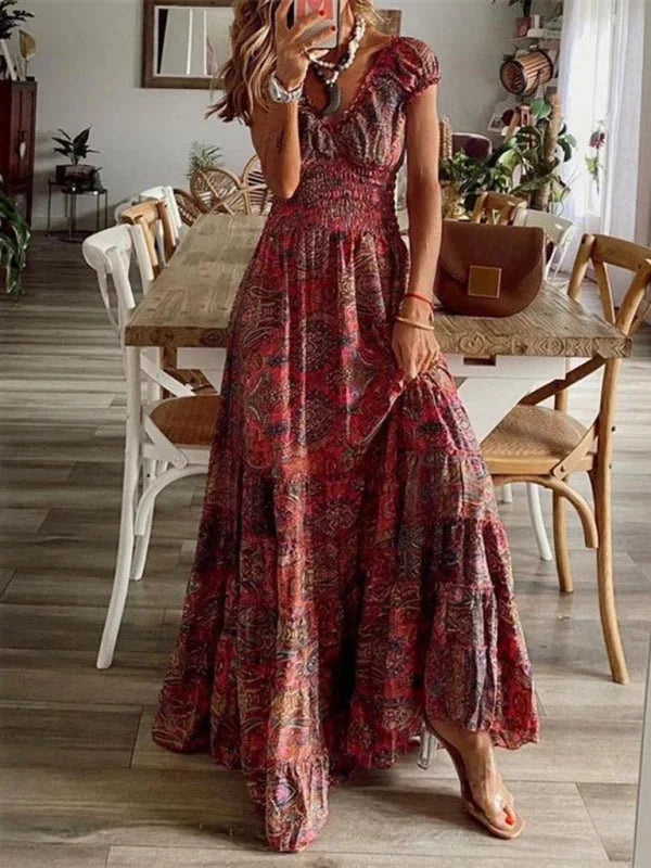 Aiyla red maxi dress with V-neck, tiered design, perfect for bohemian style, made from lightweight and breathable fabric.