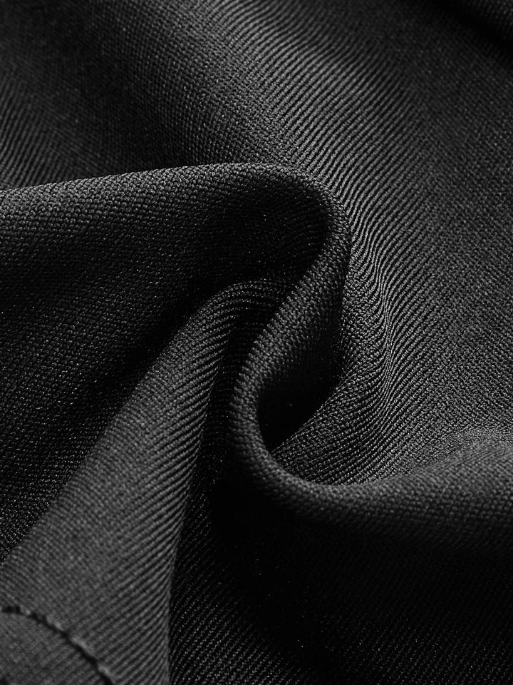 Rhythm sleek halter crossover top in soft silk blend with deep neckline and stylish criss-cross detailing.