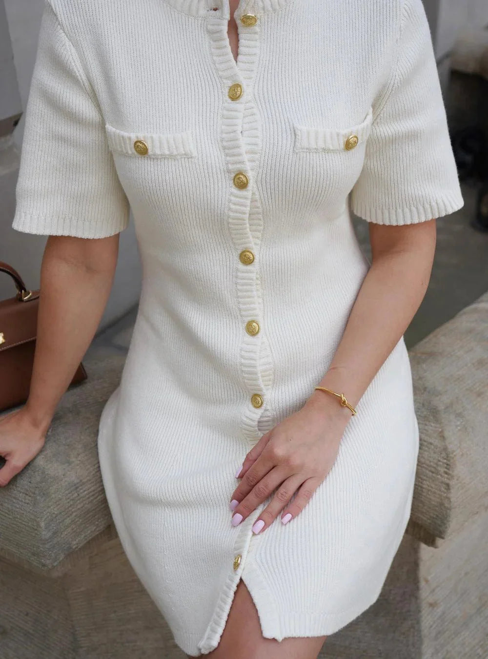 Short sleeve ribbed mini dress in Rhys design, made of soft, stretchy fabric, perfect for a casual-chic look.