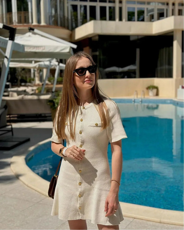 "Ribbed mini dress with short sleeves in Rhys color, perfect for casual chic outfits."