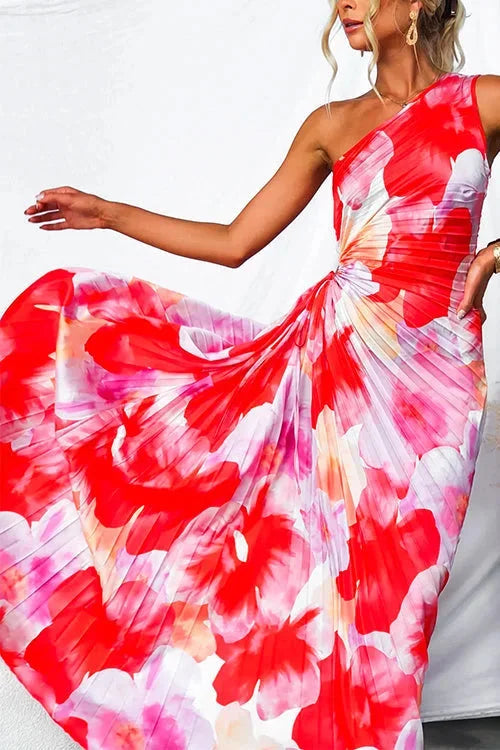 Asymmetric neckline floral maxi dress in soft fabric with a bold pattern, perfect for a stylish and trendy look.