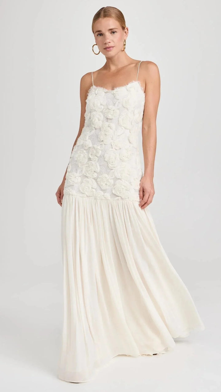 Sleeveless lace top maxi dress in a delicate ivory lace overlay design, perfect for a romantic and elegant look.