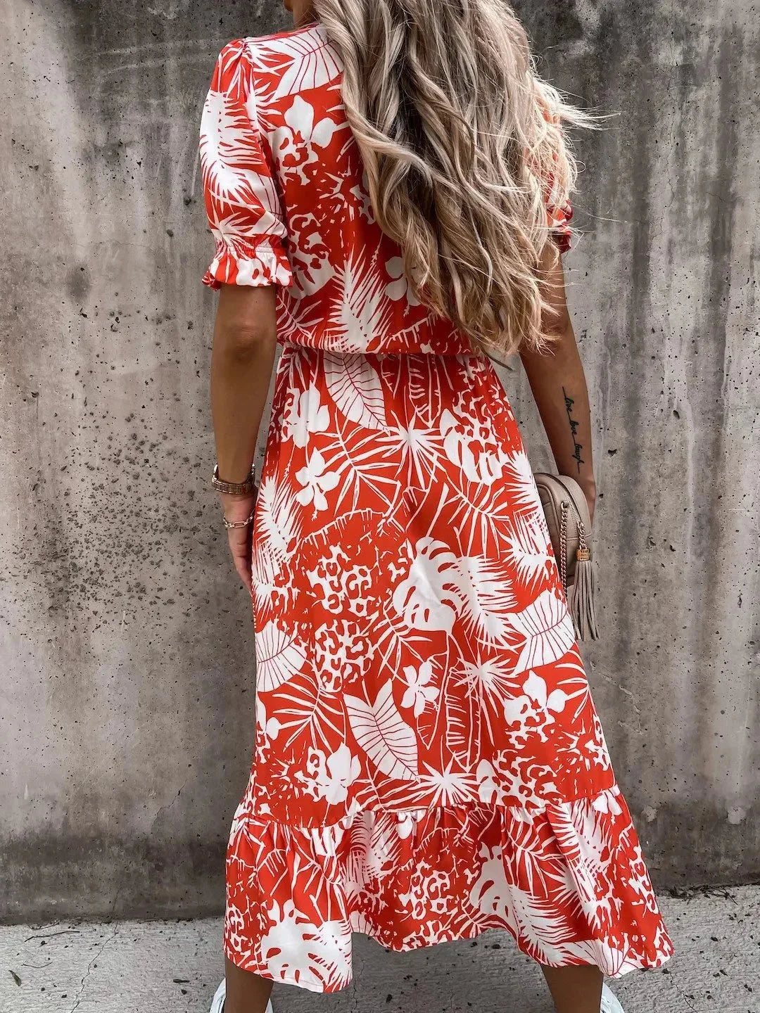 Floral print midi dress with wrap front design, crafted in vibrant colors - Kasandra collection.