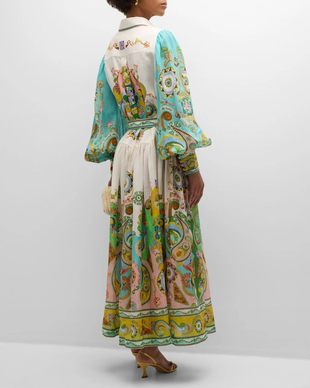 Anneliese maxi dress with paisley print and balloon sleeves, made from lightweight flowing fabric with a bohemian-inspired…