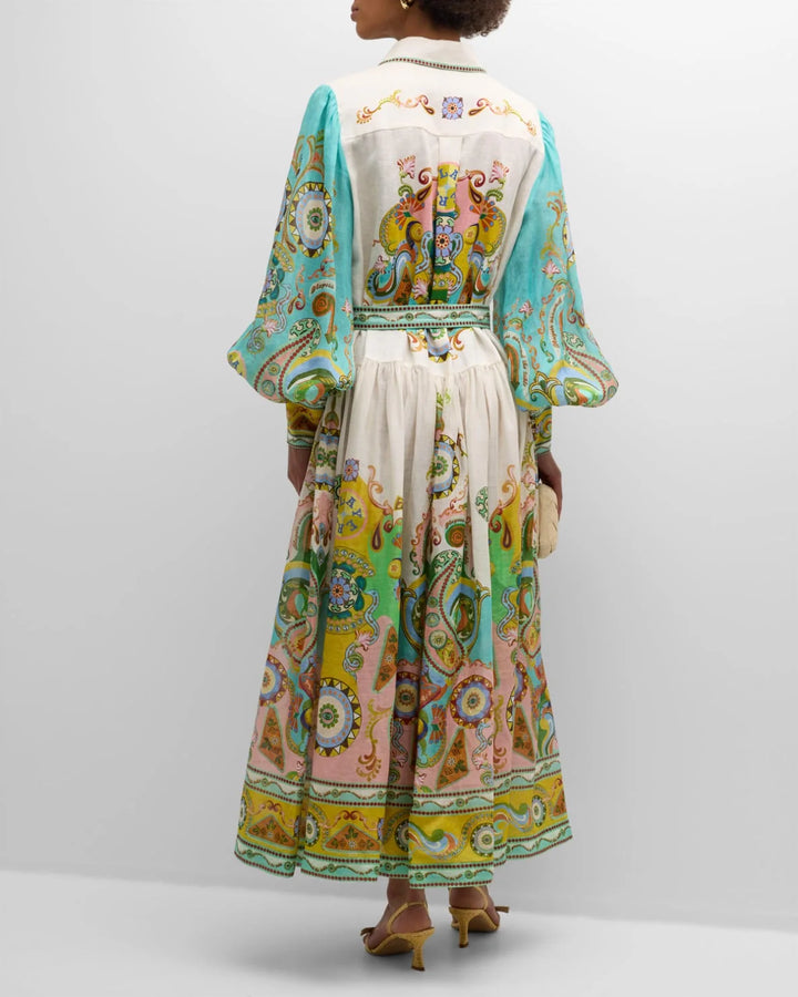 Anneliese maxi dress with paisley print and balloon sleeves, made from lightweight fabric, perfect for a bohemian chic look.'