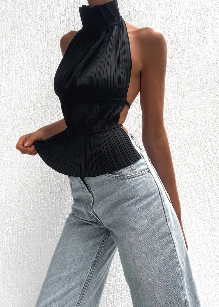 "Avi Women's halter top in black with metallic chain accents on neckline and racerback, made of soft cotton blend…