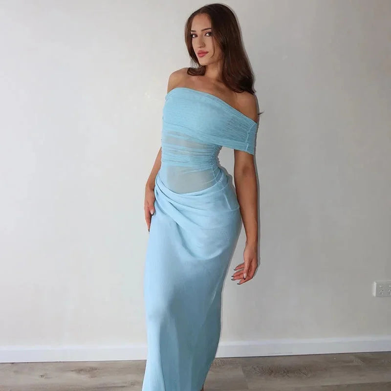 Off-shoulder ruched maxi dress in Ariely, featuring a waist cut-out. Made with lightweight, breathable fabric perfect for…