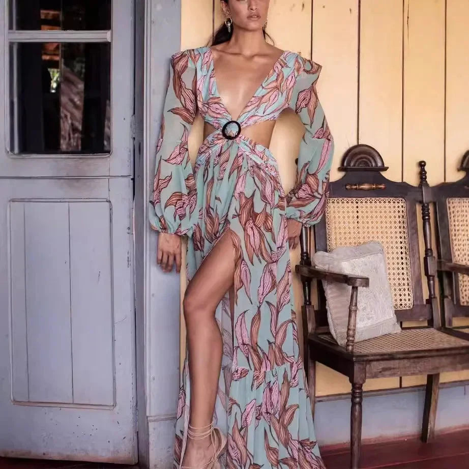 "Black long-sleeved deep-V maxi dress with waist tie, perfect for formal occasions, made from high-quality fabric."