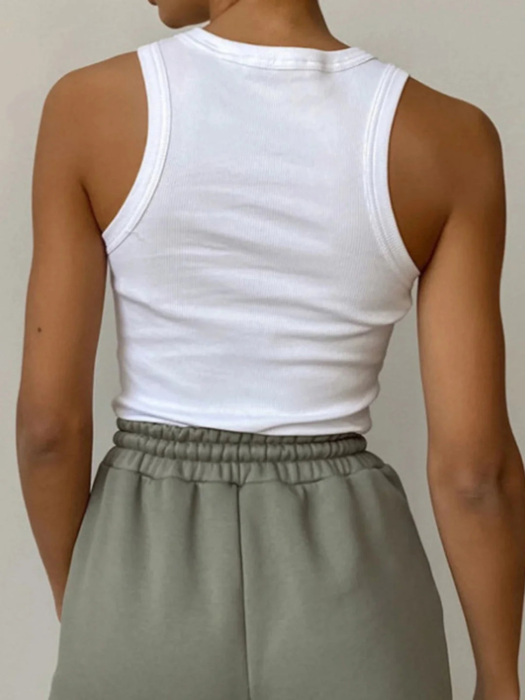 Sleeveless ribbed tank top in Audra style, versatile and stylish for any outfit with a soft and stretchy fabric.