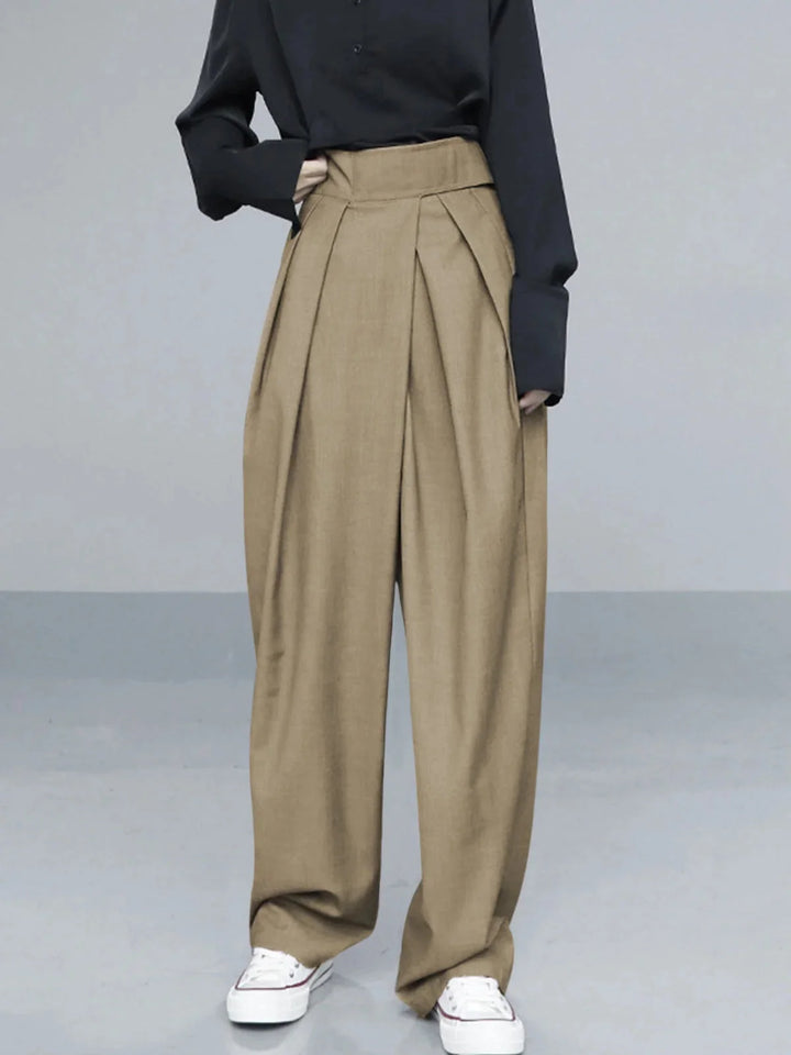 Khaki wide-leg pants with adjustable fit from Adelyne. Made with soft, breathable fabric for all-day comfort and versatile…