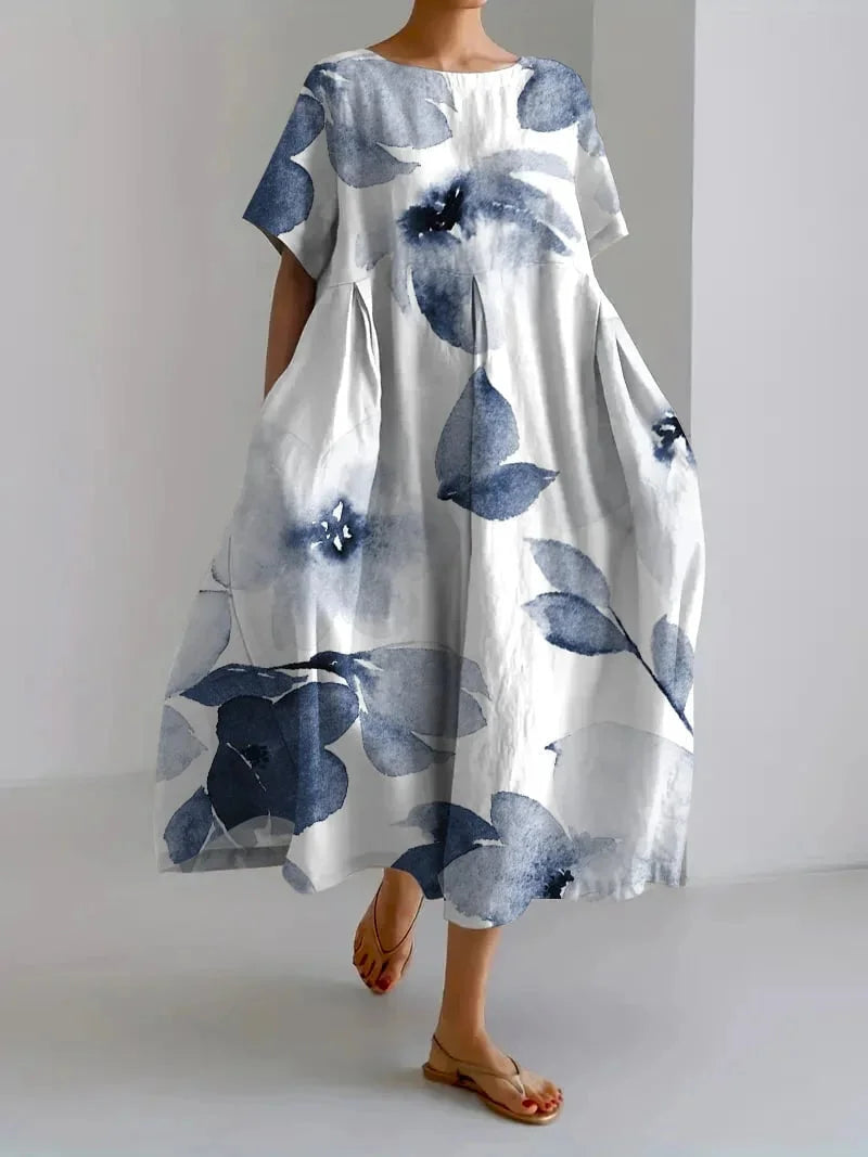 Indigo floral maxi dress made for comfort, features a flowy design and Avanna flowers.