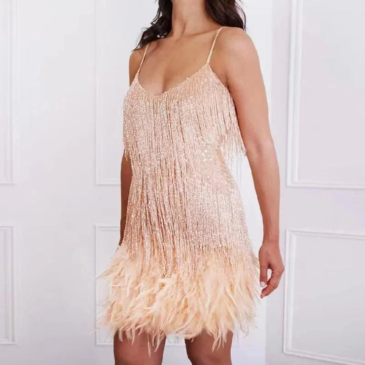 "Emberly spaghetti strap mini dress featuring sequins and feathers, perfect for a glamorous and chic evening look."
