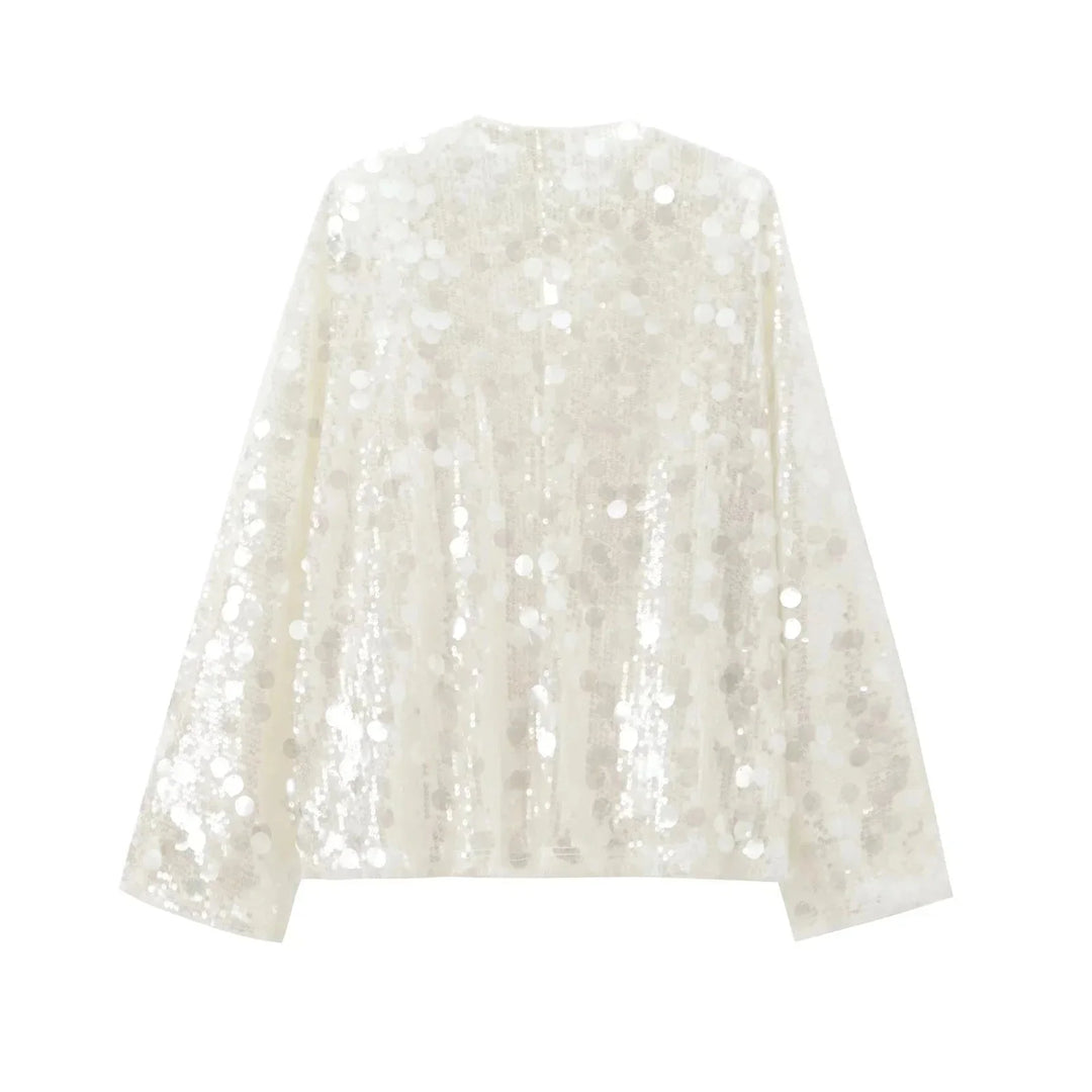 Ivory sequin v-neck blouse for women by Isamar, featuring elegant sequin detailing on a classic v-neck design.