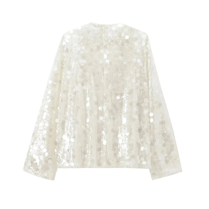 Ivory sequin v-neck blouse for women by Isamar, featuring elegant sequin detailing on a classic v-neck design.