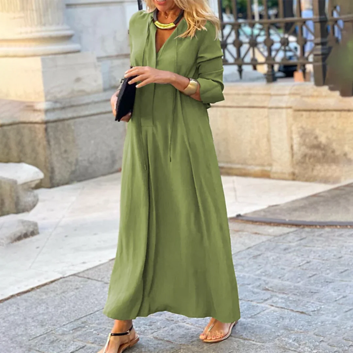 "Green Elianna Maxi Dress, a stylish and comfortable dress designed for versatility with a flowy silhouette in soft and…