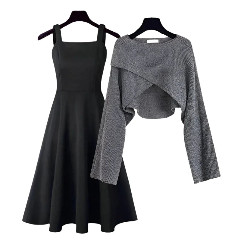 Grey knit dress with asymmetrical sweater detailing by Fallyn. Flared silhouette for a stylish and contemporary look.