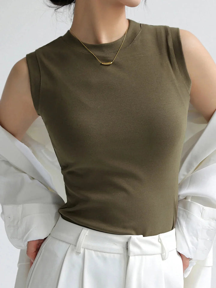 Sleeveless fitted top in Aislinn design, features a comfortable and stretchy fabric, perfect for versatile styling in any…