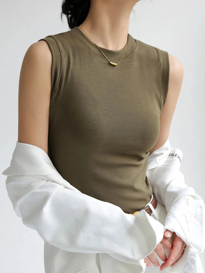 Sleeveless fitted top in Aislinn, made of soft cotton blend with a ribbed texture and crew neckline.