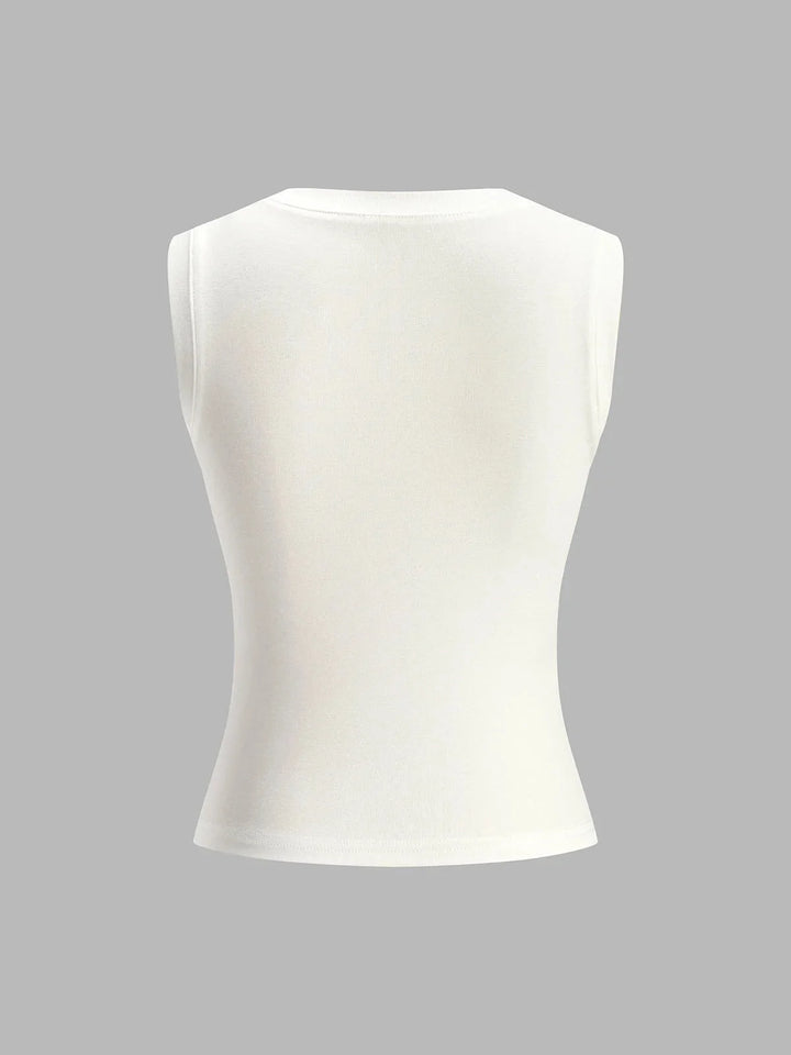 Sleeveless fitted top in Aislinn style, featuring a ribbed texture and high neckline, perfect for versatile casual or…