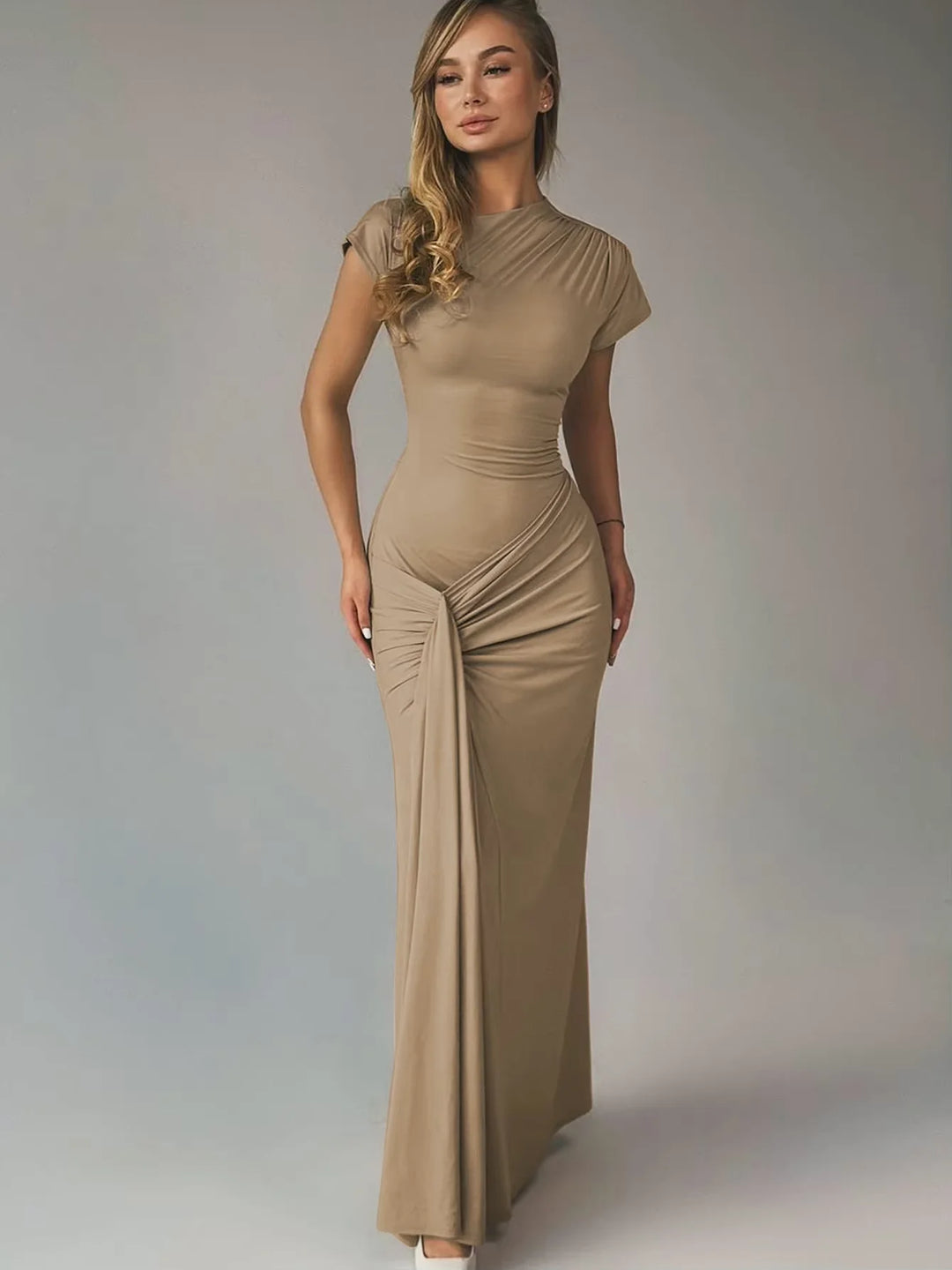 Reverie maxi dress in a flattering ruched design with capped sleeves, made from breathable and comfortable fabric.
