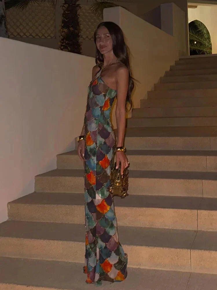"Marlei dress: Halter neck floor-length design in multicolor fabric, perfect for a stylish and vibrant look."