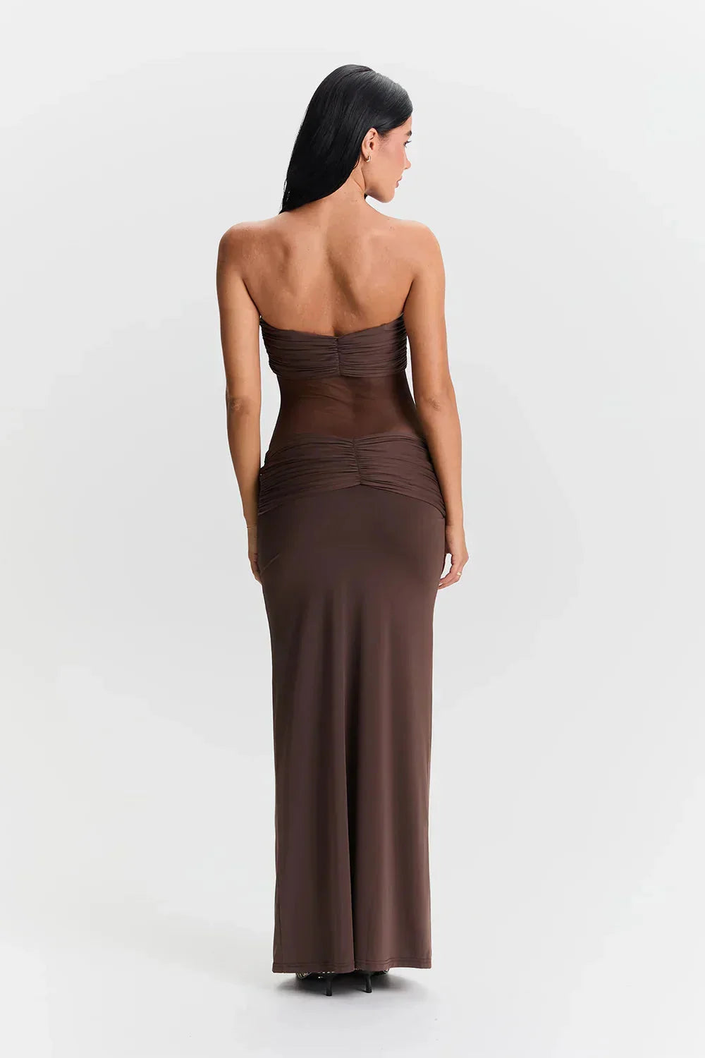 Women's strapless maxi dress with mesh bodice in black, perfect for summer parties. Cotton blend fabric with intricate…