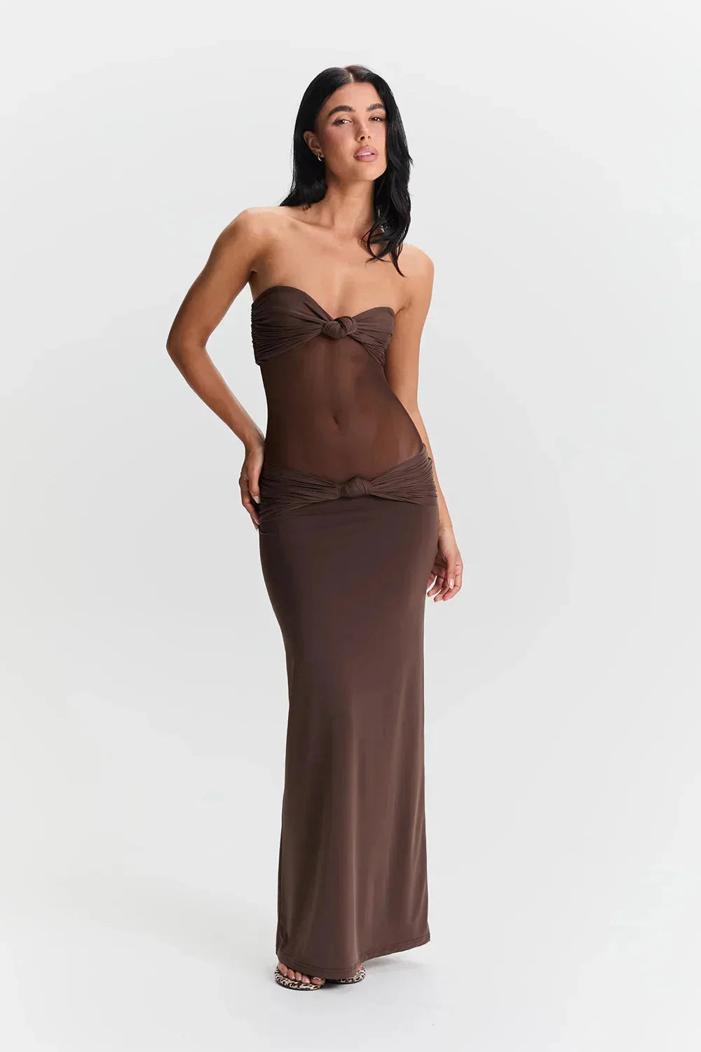 Strapless brown maxi dress with mesh bodice showcasing elegant design ideal for formal occasions.