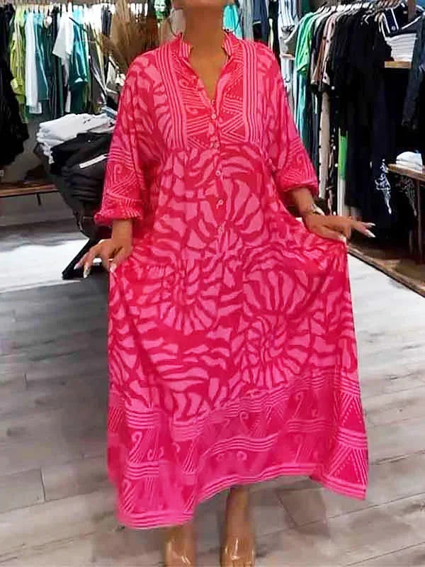 "Ren - Flowy printed navy maxi dress with a v-neck, short sleeves, and cinched waist, suitable for all body types"