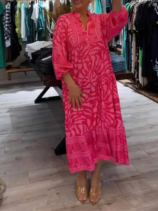 "Ren maxi dress with a flowy silhouette and vibrant print suitable for all body types."