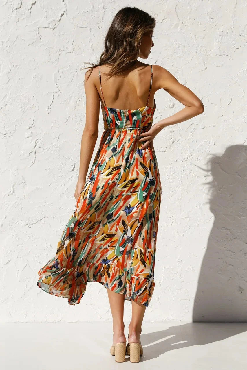 Flowy maxi dress with vibrant print featuring a soft and breathable fabric, perfect for a bohemian-inspired summer look.