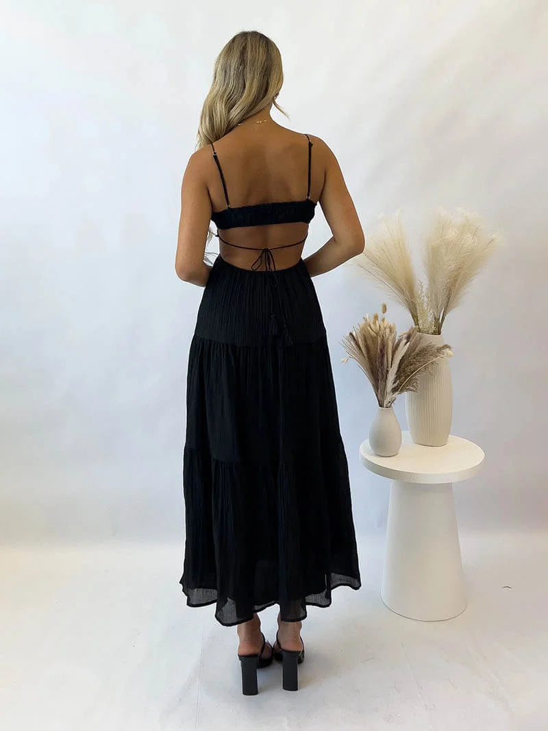 "Jo tiered maxi dress in light and flowing fabric with drawstring waist, perfect for effortless summer style."