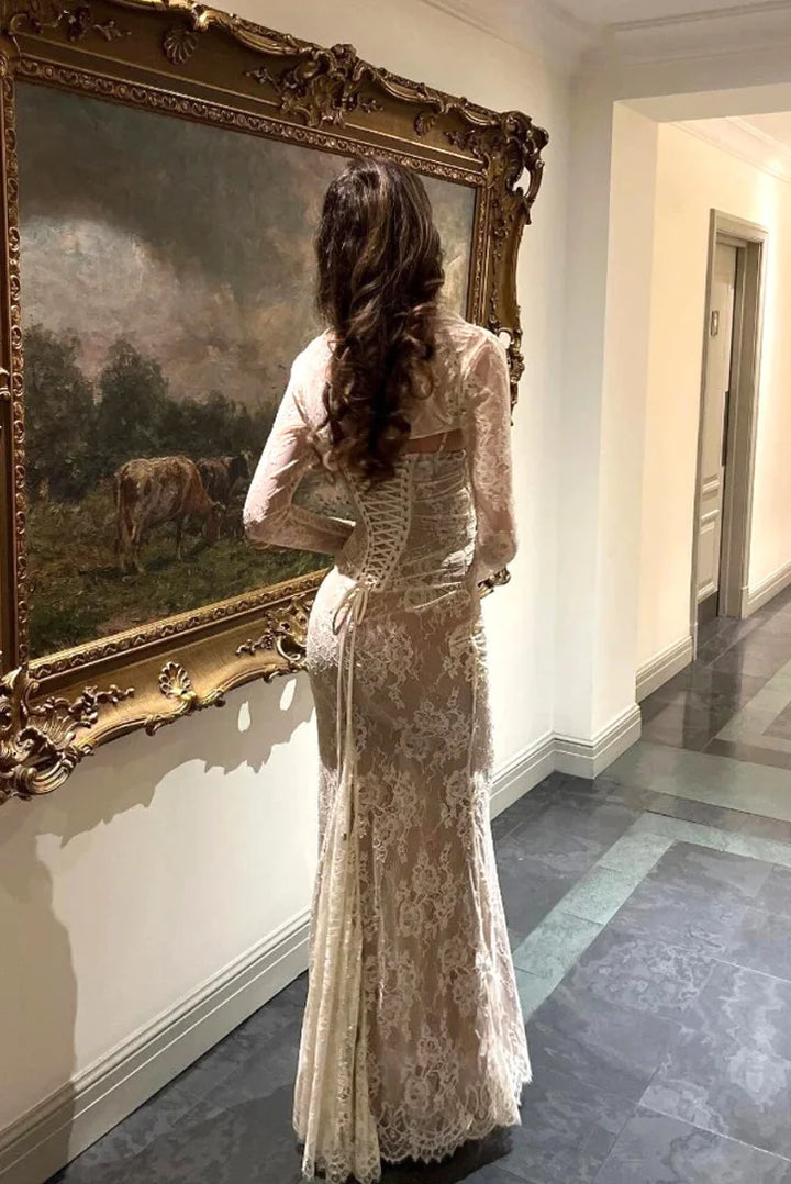 White lace dress with sleeves in Muslima style, perfect for effortless elegance.
