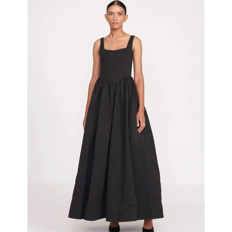 Black square neckline midi dress in sleeveless design by Aleah. Features elegant silhouette and versatile style for any…