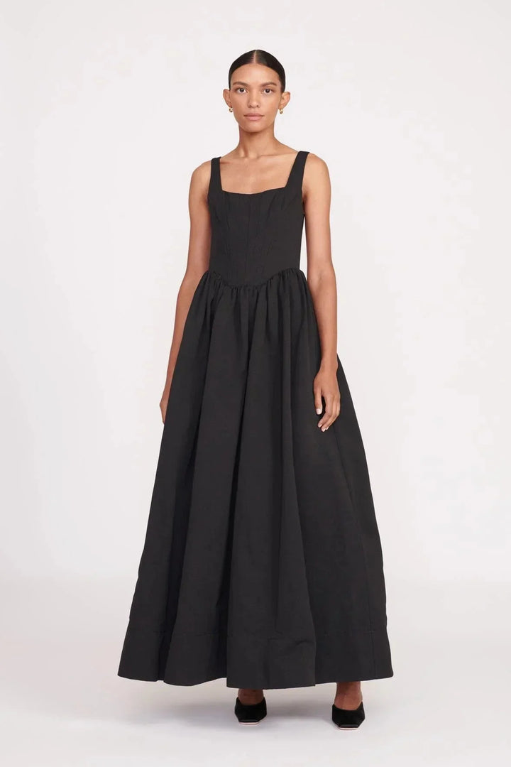 "Black sleeveless midi dress with square neckline, perfect for formal occasions, made from high-quality fabric."
