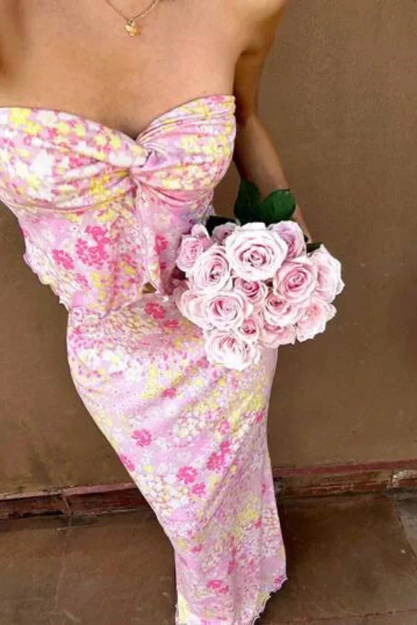 Pink floral cut-out maxi outfit featuring intricate floral design in a soft, flowing material - perfect for a bohemian…