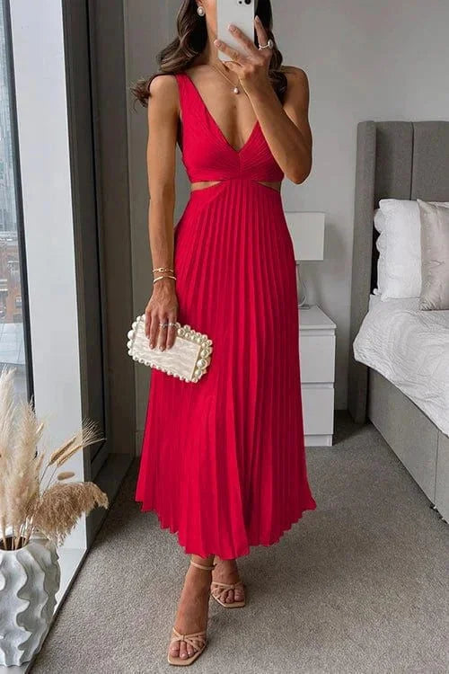 Red pleated midi dress with cut-out accents by Quetzalli, featuring a sophisticated and elegant design perfect for any special…