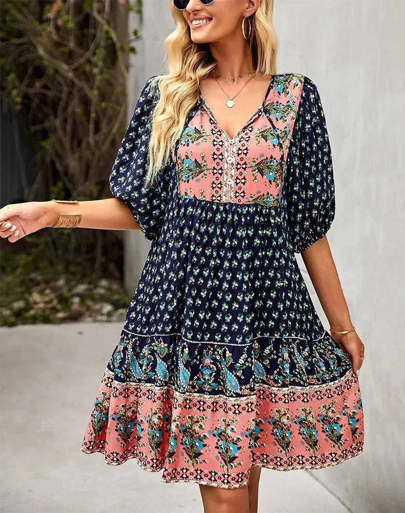 "Laniyah mini dress with a v-neck and elastic waist, perfect for casual outings, made from soft and breathable fabric."