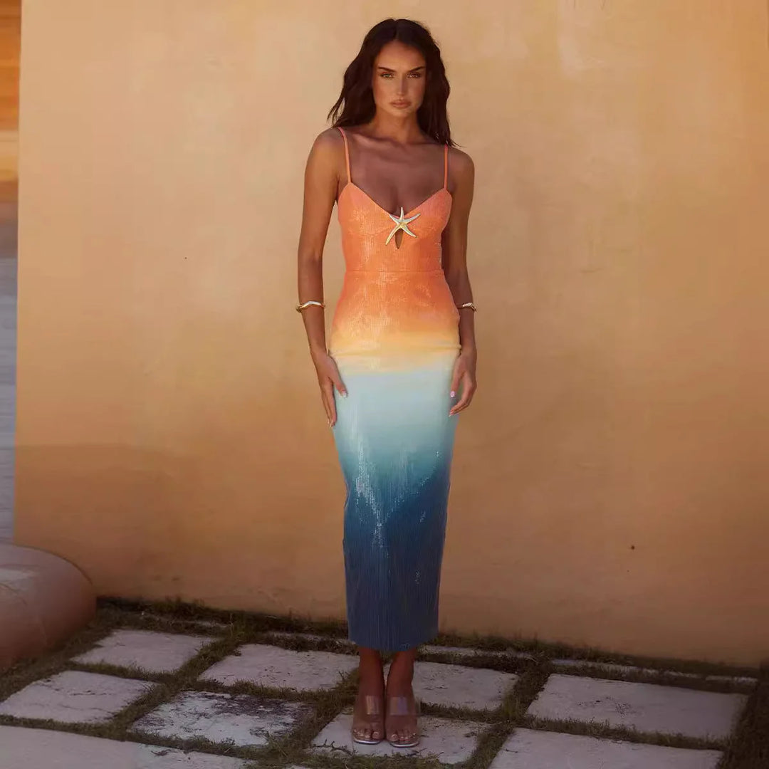 "Bellamie midi dress with sunset ombre design and starfish detail, perfect for summer days at the beach"