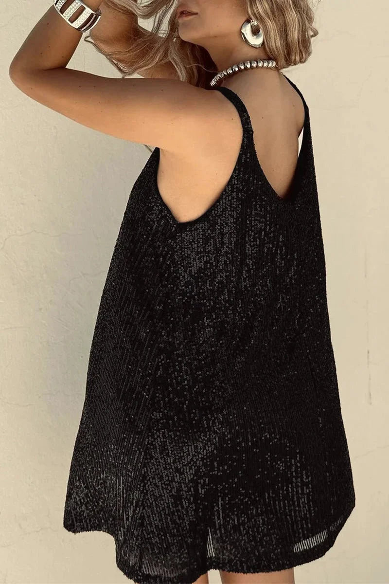 Sleeveless black romper with V-neck adorned with sparkly sequins for a glamorous look.