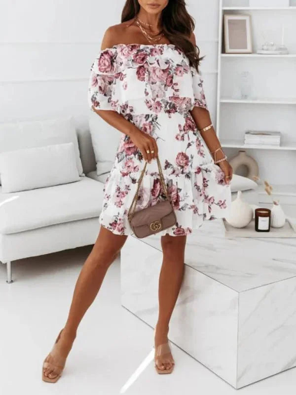 "Everest pink mini dress with tiered floral design and off-shoulder style, perfect for a summer day out"
